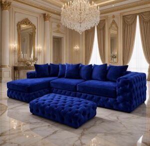 Royal blue chaise sofa and matching footstool in grand room