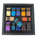 A box of Green and Blacks chocolates showing the open box of chocolates