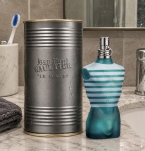 Bottle and tin of John Paul Gaultier aftershave Le Male