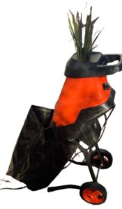 Maxlaner Shredder and Mulcher with palm tree leaves being sucked in