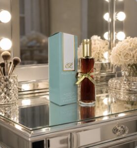 Bottle of Estee Lauder Youth Dew perfume on a mirrored dressing table